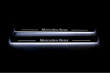 Mercedes CLS II (C218) 2010+ illuminated entry guards in stainless steel with Mercedes-Benz logo