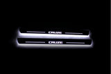 Chevrolet Cruze I 2008+ illuminated entry guards in stainless steel with Cruze logo