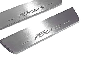 Illuminated LED Door Sill Tread Plates Ford Focus III 2011-2018 With Focus Logo Ford Led Door Sills opdesign