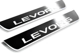 Close-up of Levorg lettering and linear slots in silver-finished door sill plates.