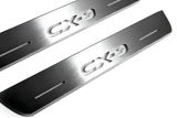Mazda II 2016+ entry guards in stainless steel with CX-9 logo