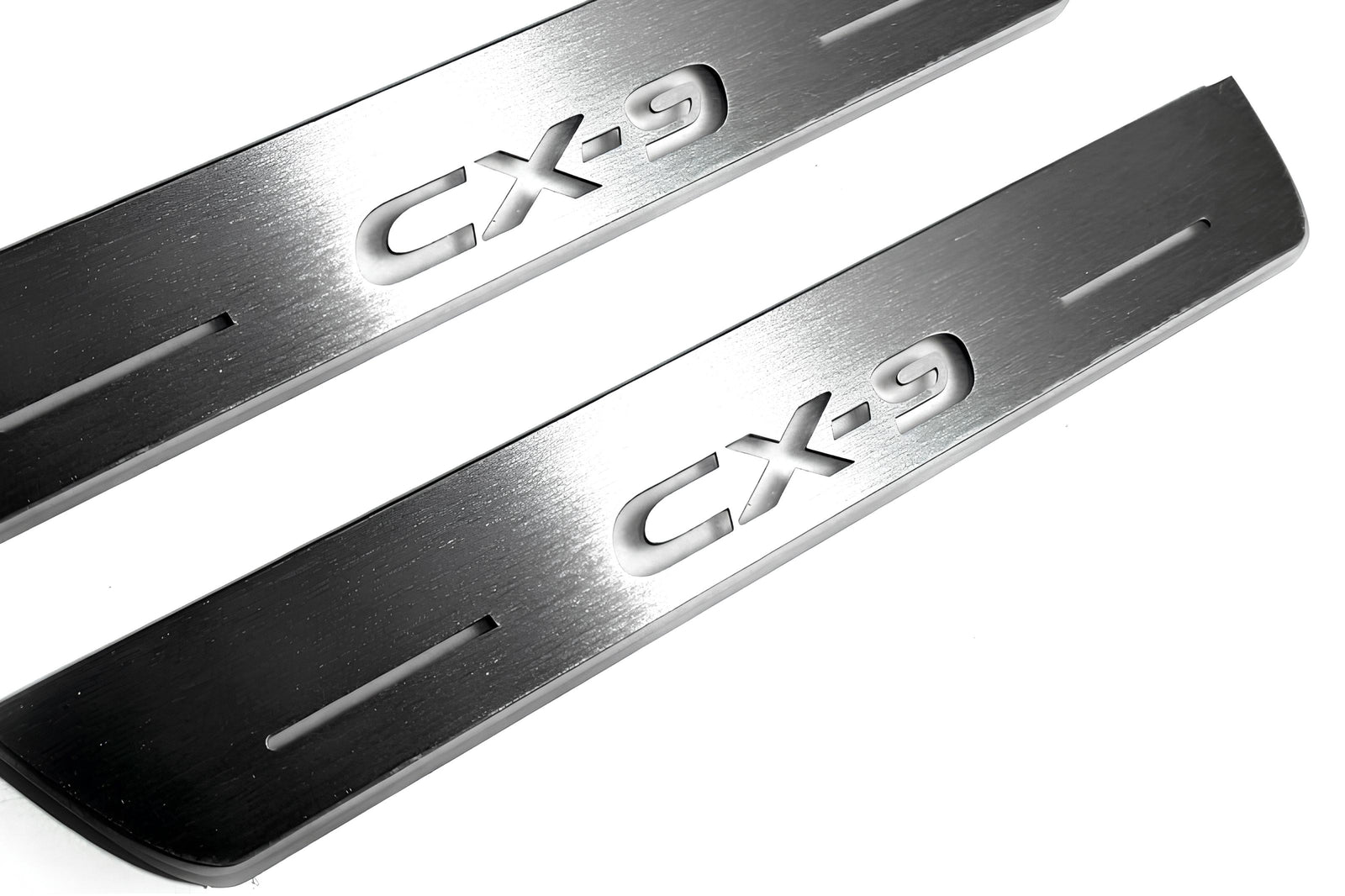Mazda II 2016+ entry guards in stainless steel with CX-9 logo
