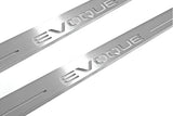 Close-up of Evoque lettering and linear slots in silver-finished door sill plates.