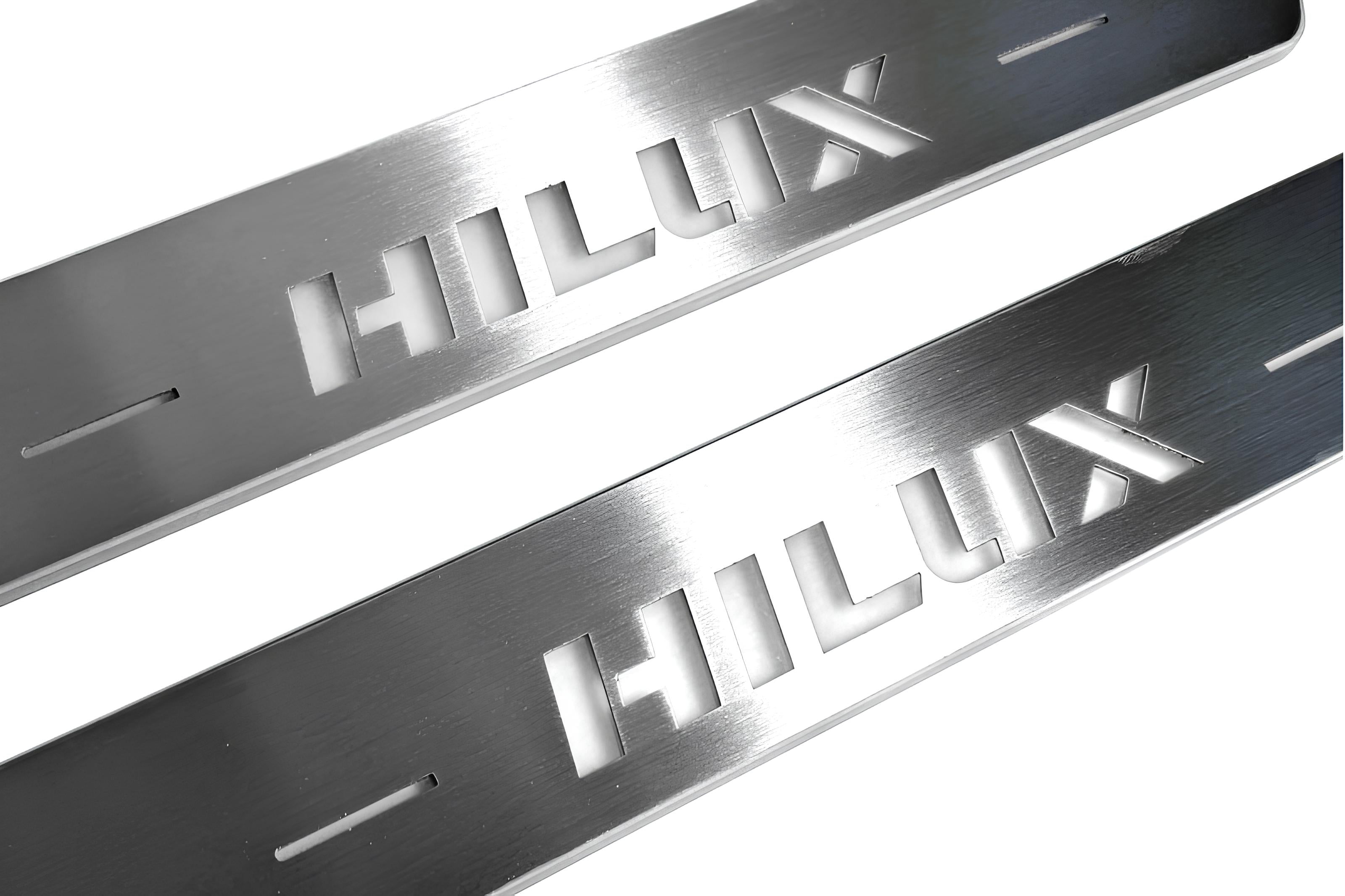 Illuminated LED Door Sill Tread Plates Toyota Hilux VIII 2015+ With Hilux Logo Toyota Led Door Sills opdesign