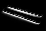 Mercedes GL X164 2006+ entry guards in stainless steel with Mercedes-Benz logo