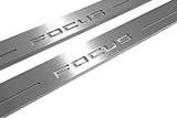 Ford Focus IV 2018+ LED door sill plates in stainless steel with Focus logo
