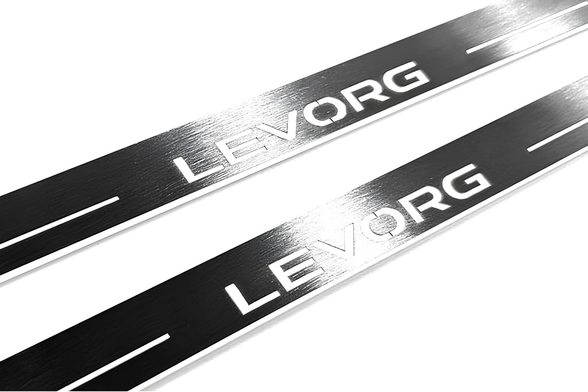 Close-up of Levorg lettering and linear slots in silver-finished door sill plates.