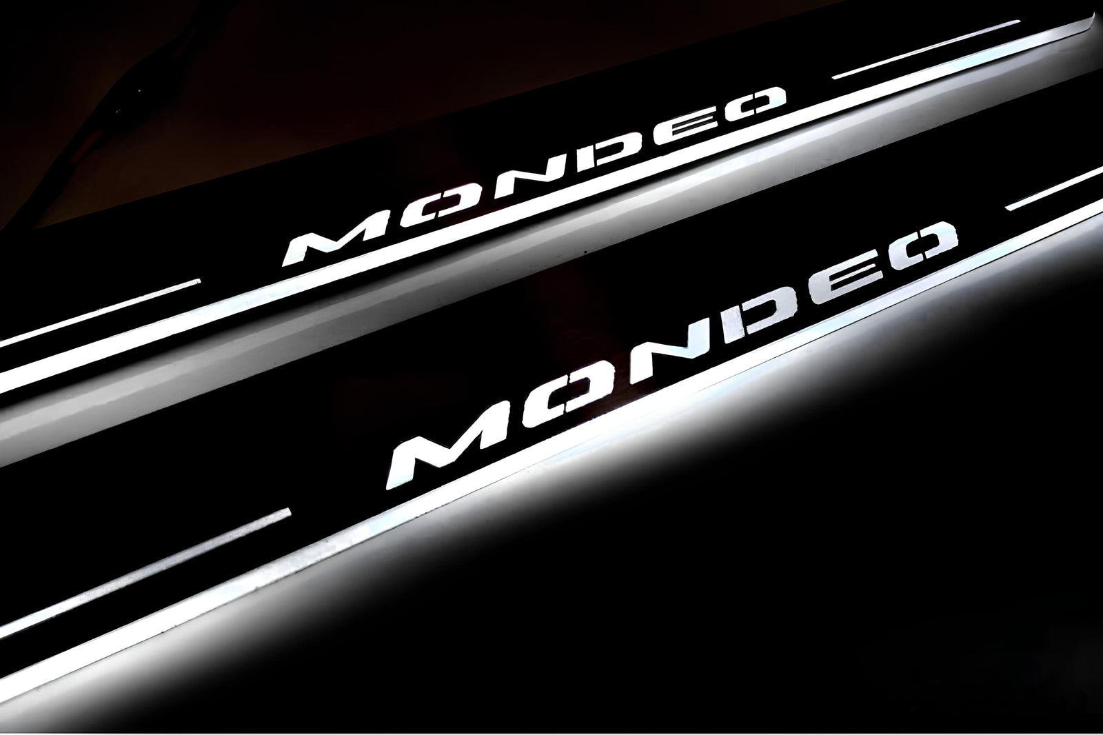 Ford Mondeo V 2014+ LED door sill plates in stainless steel with Mondeo logo