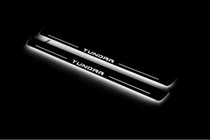 Illuminated LED Door Sill Tread Plates Toyota Tundra IV 2022+ With Tundra Logo Toyota Led Door Sills opdesign