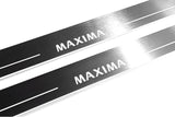 Close-up of Maxima lettering and linear slots in silver-finished door sill plates.