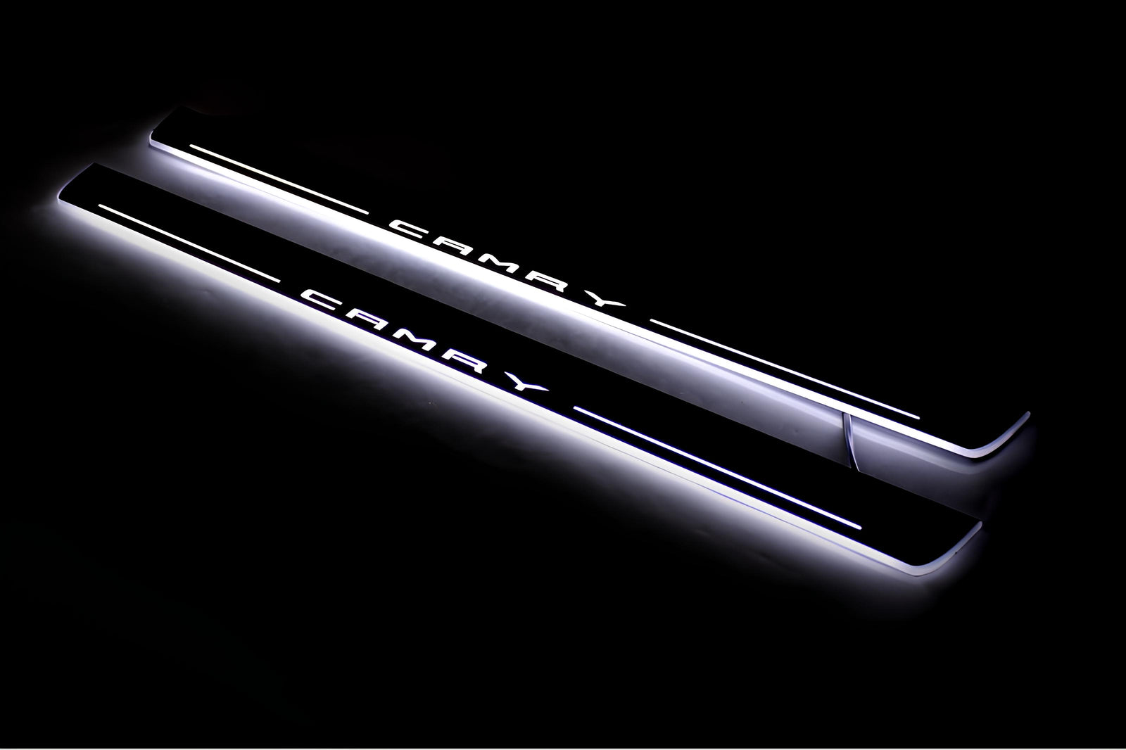 Toyota Camry V70 2018+ illuminated entry guards in stainless steel with Camry logo
