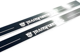 Chevrolet Camaro V E37 2009+ illuminated entry guards in stainless steel with Transformers logo