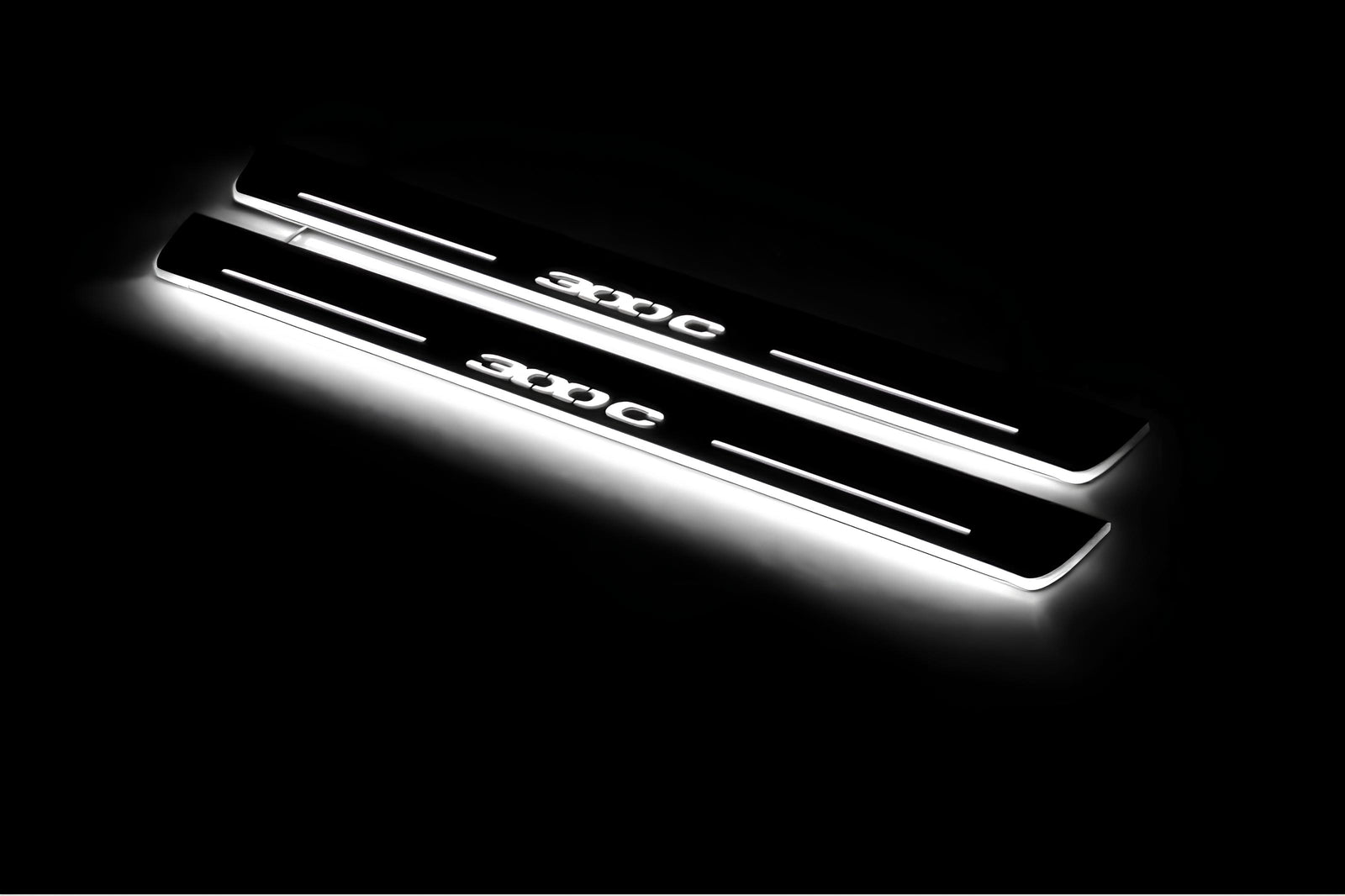 Chrysler 300C II LD 2011+ LED door sill plates in stainless steel with 300C logo