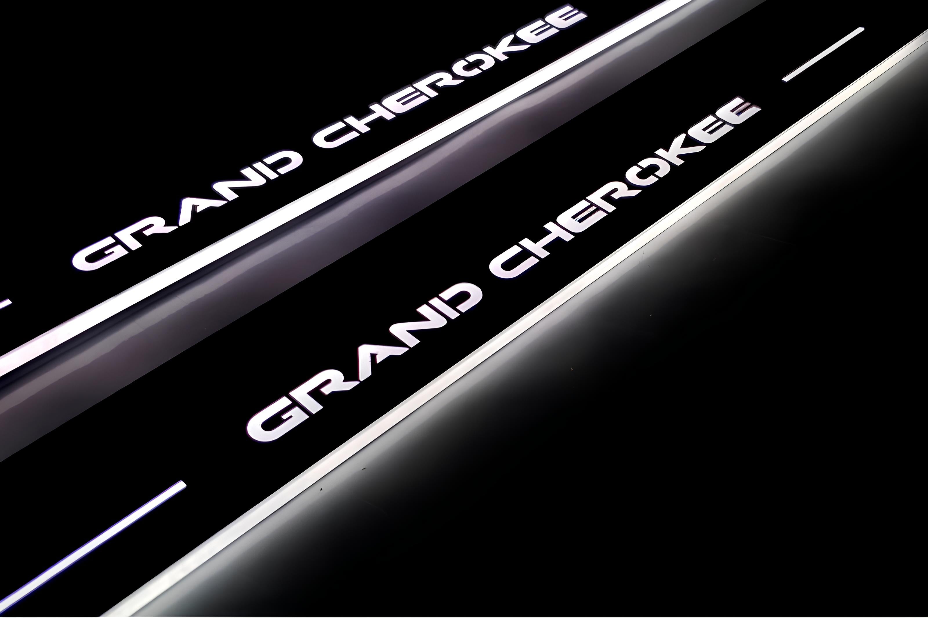 Illuminated LED Door Sill Tread Plates Jeep Grand Cherokee IV 2010-2021 With Grand Cherokee Logo Jeep Led Door Sills opdesign