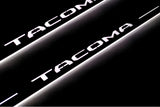 LED door sill plates Toyota Tacoma III 2016+ stainless steel with Tacoma logo