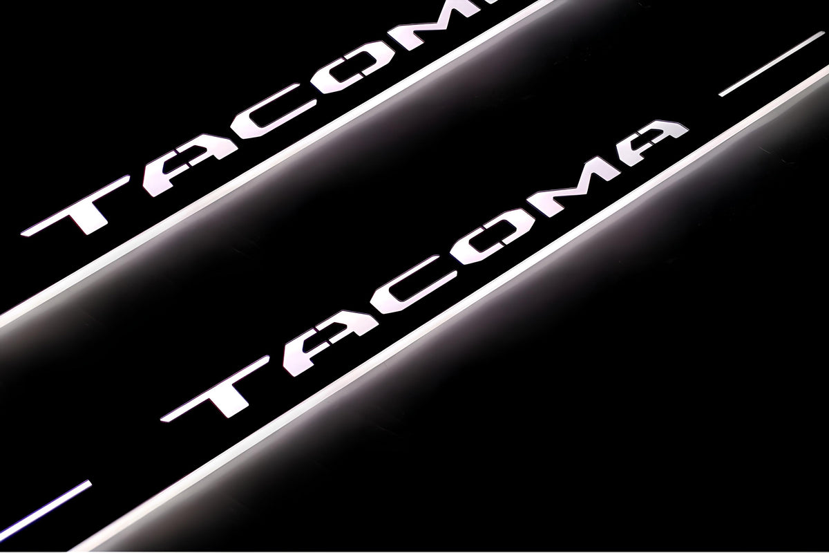 LED door sill plates Toyota Tacoma III 2016+ stainless steel with Tacoma logo