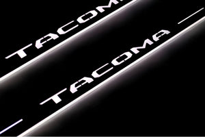 Illuminated LED Door Sill Tread Plates Toyota Tacoma III 2016+ With Tacoma Logo Toyota Led Door Sills opdesign