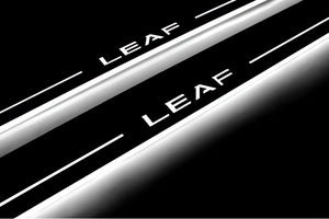 Illuminated LED Door Sill Tread Plates Nissan Leaf II 2017+ With Leaf Logo Nissan Led Door Sills opdesign