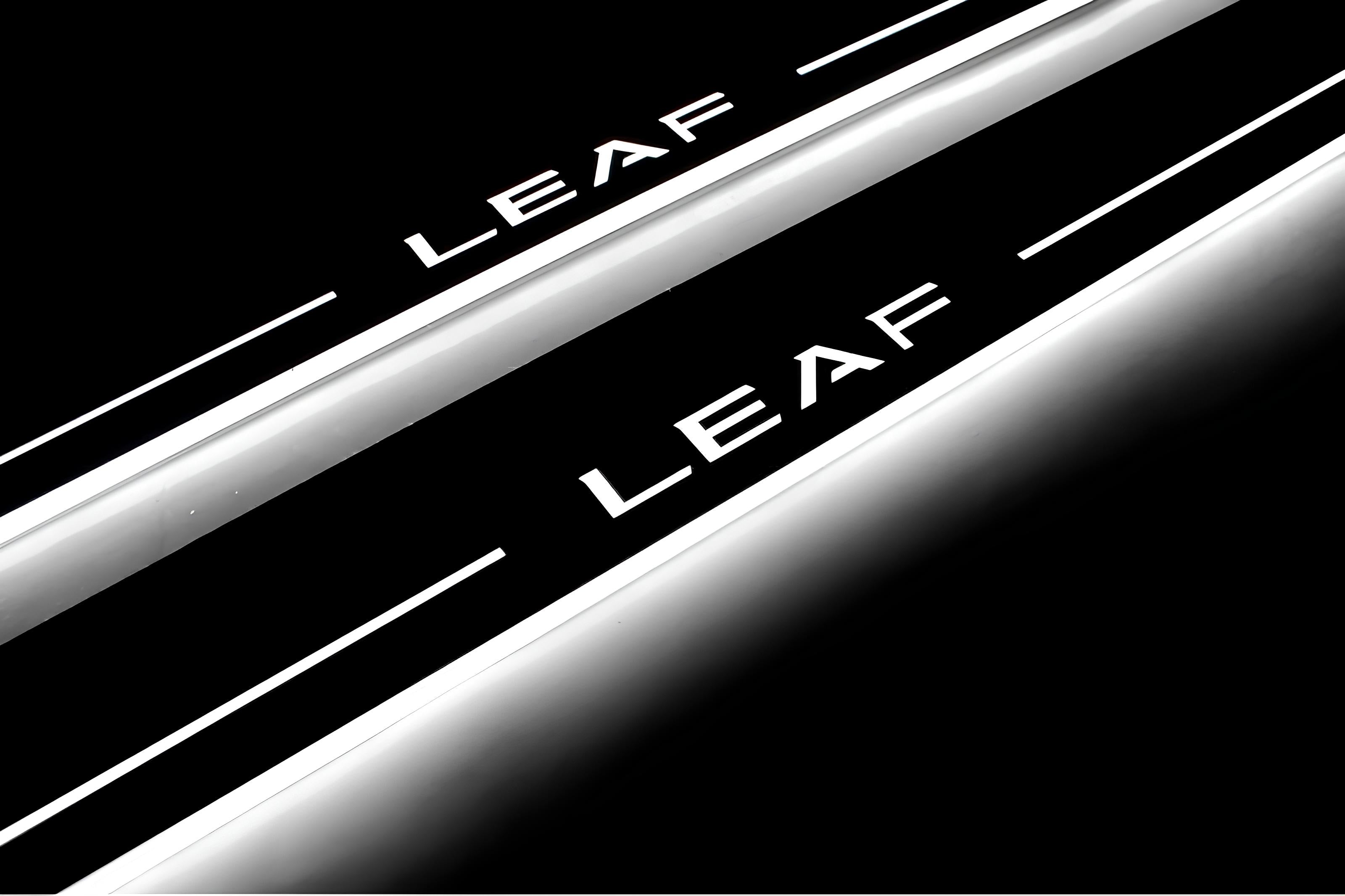 Illuminated LED Door Sill Tread Plates Nissan Leaf II 2017+ With Leaf Logo Nissan Led Door Sills opdesign