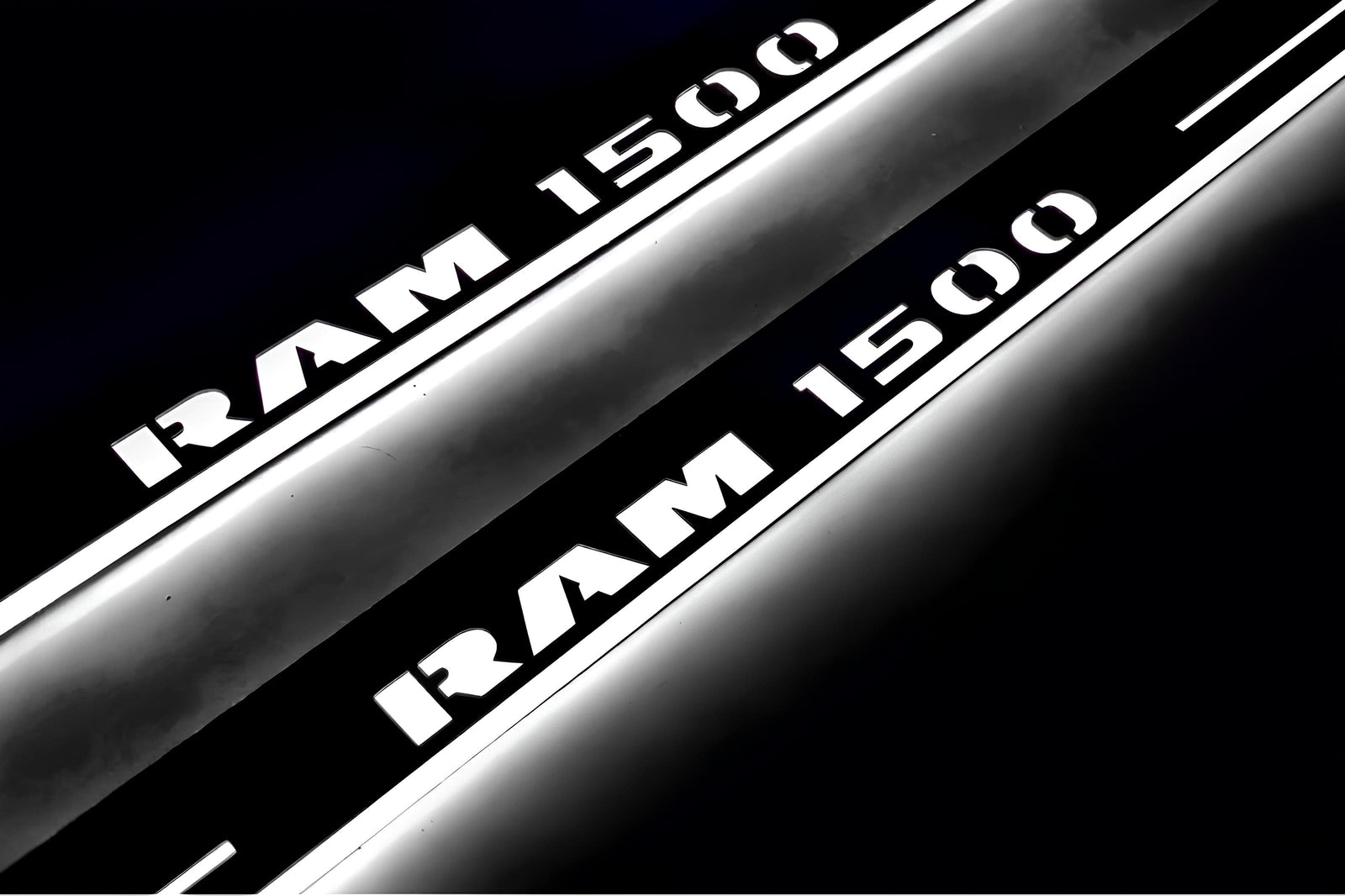 RAM 1500 IV 2009+ stainless steel illuminated entry guards with Illuminated RAM 1500 logo