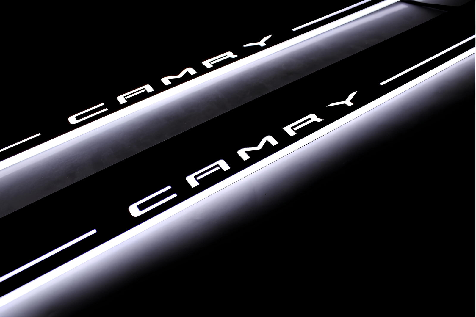 Toyota Camry V70 2018+ door sill plates in stainless steel with Camry logo