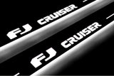 Toyota FJ Cruiser J15 2006+ door sill plates in stainless steel with FJ Cruiser logo