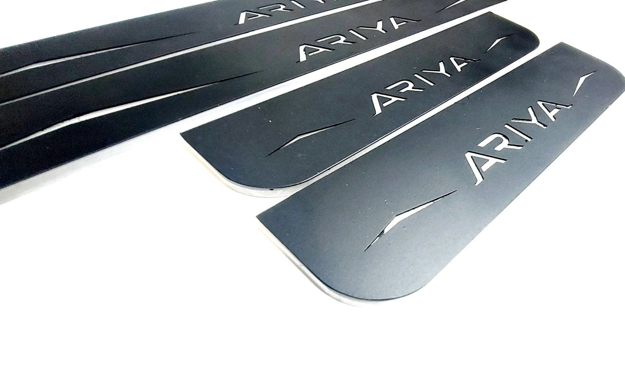 Illuminated LED Door Sill Tread Plates Nissan Ariya 2022+ With Ariya Logo Nissan Led Door Sills opdesign