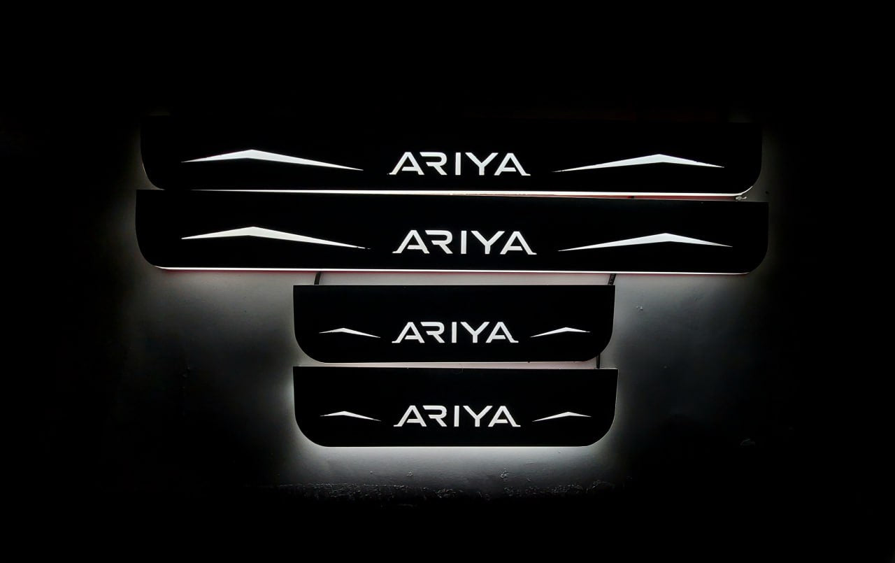 Illuminated LED Door Sill Tread Plates Nissan Ariya 2022+ With Ariya Logo Nissan Led Door Sills opdesign