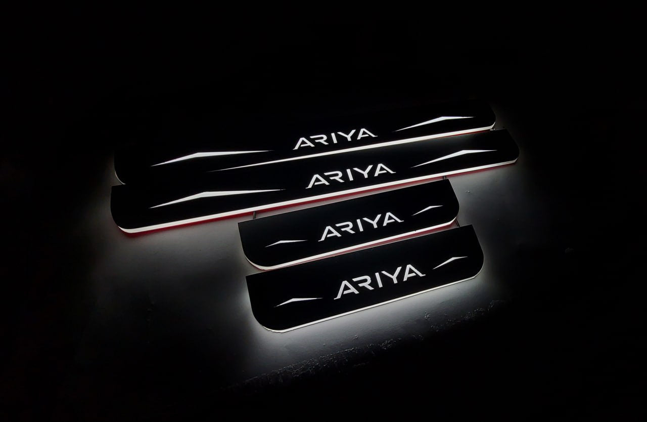 Illuminated LED Door Sill Tread Plates Nissan Ariya 2022+ With Ariya Logo Nissan Led Door Sills opdesign