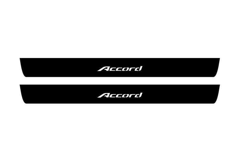 Catalog illustration of two black front door sill plates with Accord lettering.