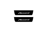 Catalog illustration of two black rear door sill plates with Accord lettering.