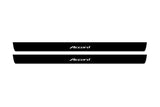 Catalog illustration of two black front door sill plates with Accord lettering.