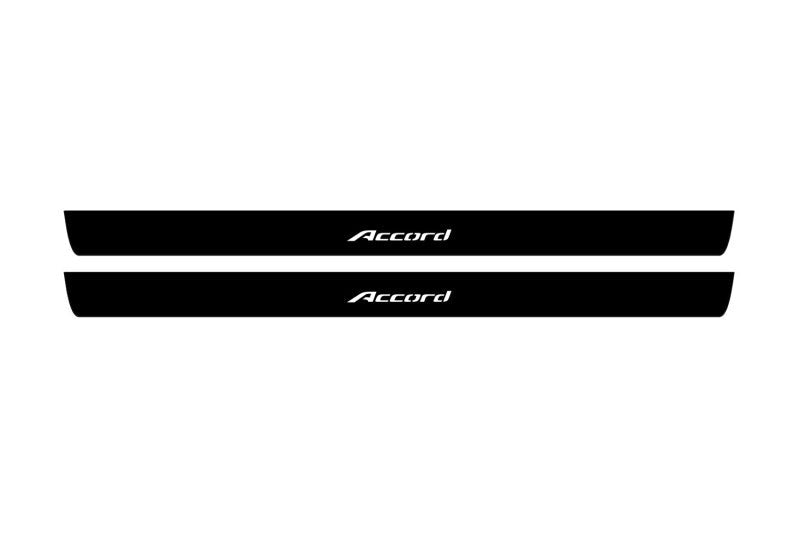 Catalog illustration of two black front door sill plates with Accord lettering.