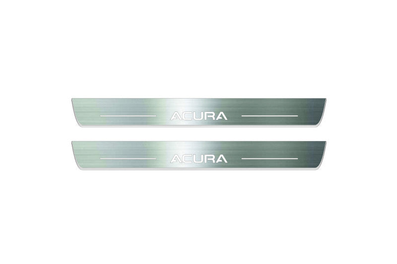 Two long silver-finished door sill plates with Acura lettering on a light background, straight-on view.