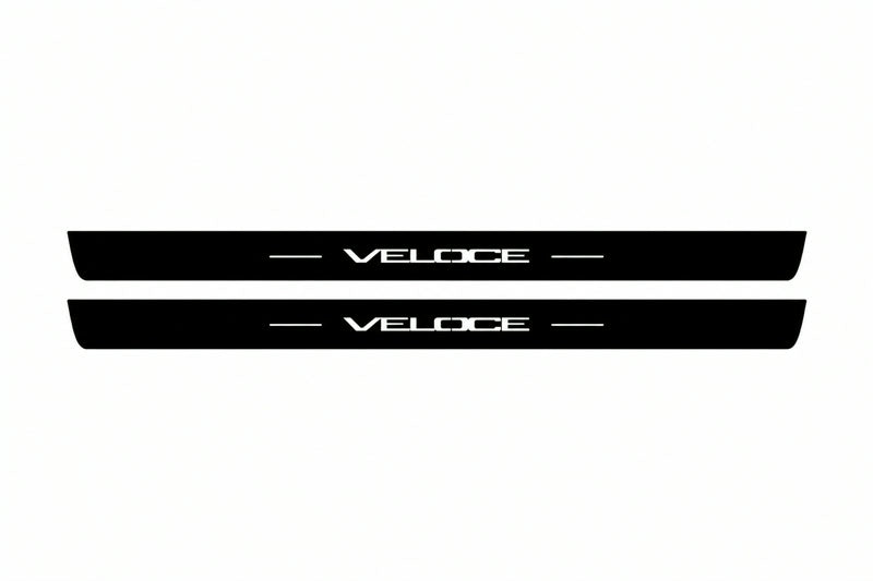 Catalogue illustration of two front black Matte PRO LED door sill plates with illuminated Veloce lettering for Alfa Romeo Giulia; dimensions are selected during manufacture.