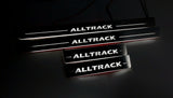 Volkswagen Passat B8 2015+ stainless steel LED door sill plates with Alltrack logo