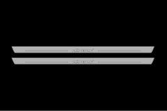 Catalog illustration of two long gray door sill plates with allroad lettering on a black background.