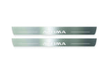 Two long silver-finished door sill plates with Altima lettering on a light background, straight-on view.