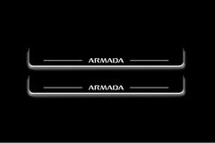 Two long door sill plates with Armada lettering and edges illuminated in white, straight-on view on a dark background.