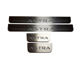 Opel Astra H 2004+ illuminated entry guards in stainless steel with Astra logo