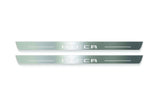 Two long silver-finished door sill plates with Ateca lettering on a light background, straight-on view.