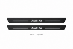 Audi A1 8X Matte PRO catalogue illustration: two black FRONT plates with illuminated Audi A1 lettering on white