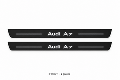 Audi A7 4K8 Matte PRO catalogue illustration: two flat black FRONT plates with illuminated Audi A7 lettering and top lines on white; not exact dimensions