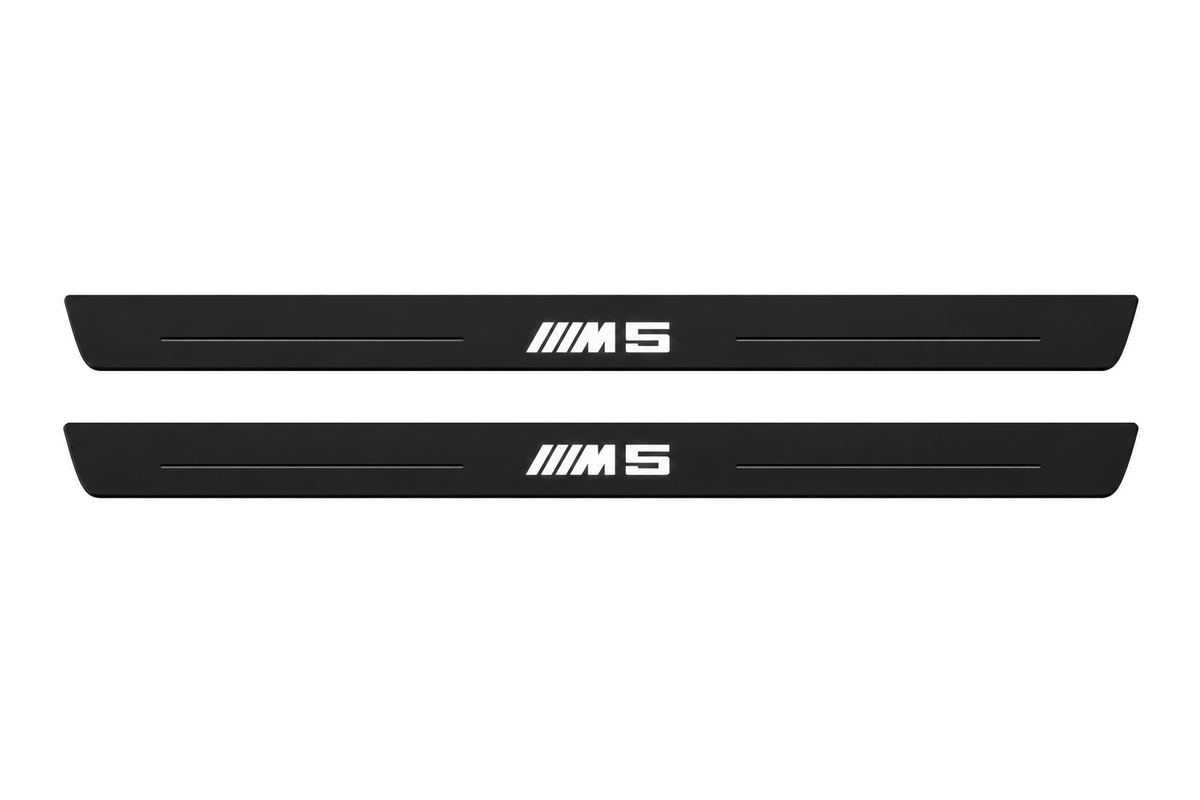 Matte PRO catalogue illustration showing two FRONT plates with illuminated M5 lettering on a white background; BMW 5 Series Sedan E34 dimensions are selected during manufacture; rear plates are not pictured.