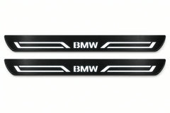 Catalogue illustration of two front black Matte PRO LED door sill plates with illuminated BMW LINE lettering for BMW 7 Series Sedan E38; dimensions are selected during manufacture.