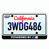 BMW POWERED BY M illuminated LED license plate badge beneath an illustrative US plate; plate not included