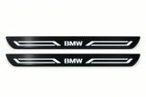 Catalogue illustration of two front black Matte PRO LED door sill plates with illuminated BMW LINE lettering for BMW X3 F25; dimensions are selected during manufacture.