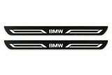 Catalogue illustration of two front black Matte PRO LED door sill plates with illuminated BMW LINE lettering for BMW X4 F26; dimensions are selected during manufacture.