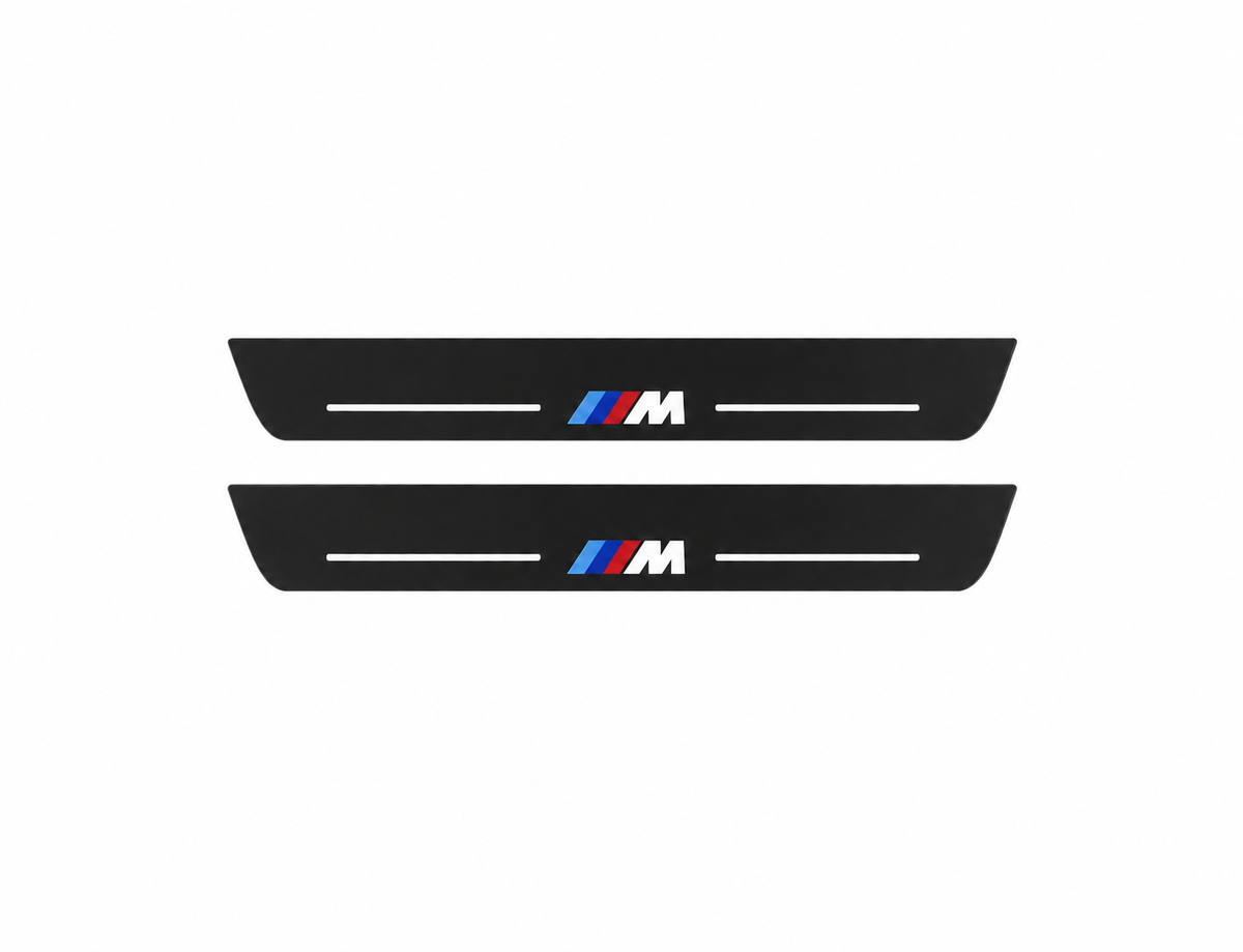 BMW X4 F26 black matte LED door sills with M Type 3 design on white background