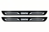 Catalogue illustration of two front black Matte PRO LED door sill plates with illuminated BMW LINE lettering for BMW X5 F15; dimensions are selected during manufacture.